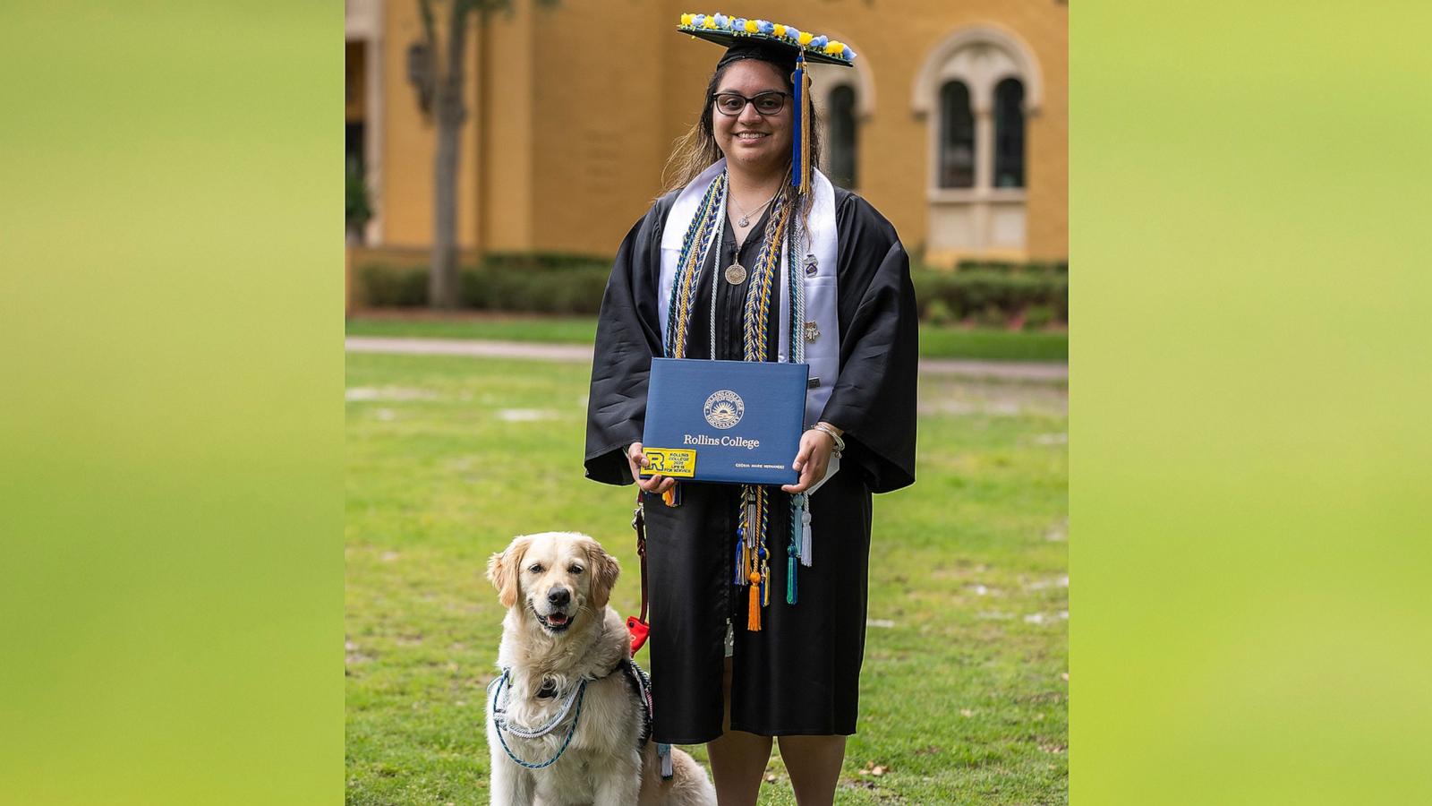 PHOTO: Cecilia Hernandez graduated from Rollins College on May 11 with a bachelor’s degree in chemistry alongside her service dog Canela.