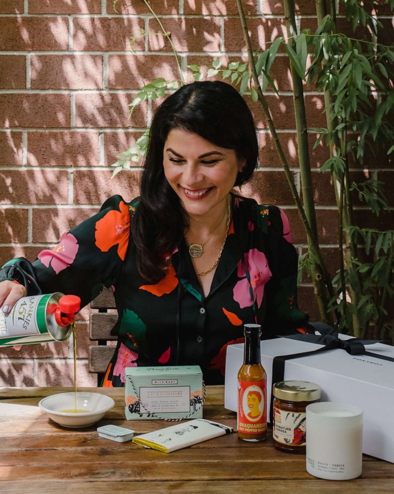 PHOTO: Nilou Motamed pours some of her favorite local olive oil, included in her Foxtrot box.