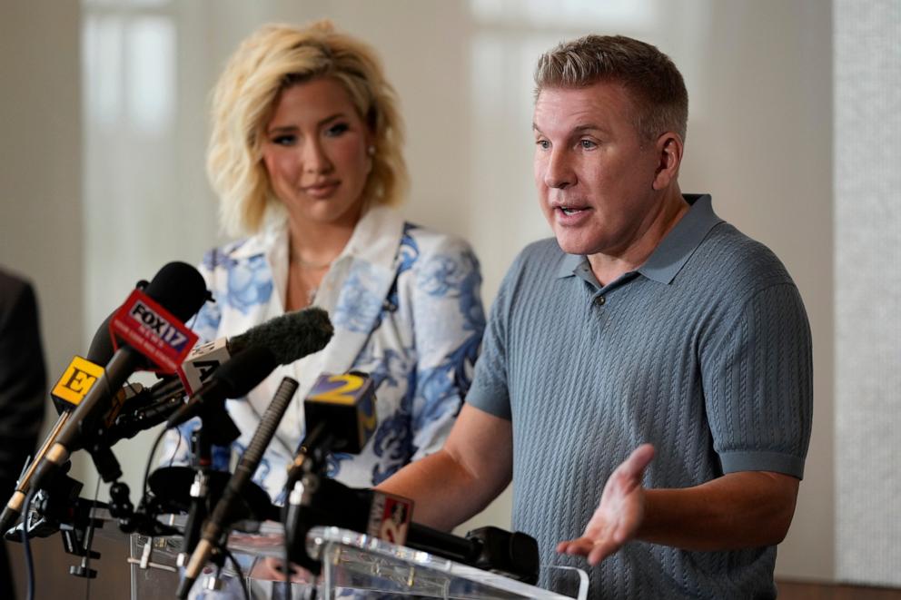 PHOTO: Todd Chrisley speaks as his daughter Savannah Chrisley looks on during a news conference, May 30, 2025, in Nashville, Tenn. 
