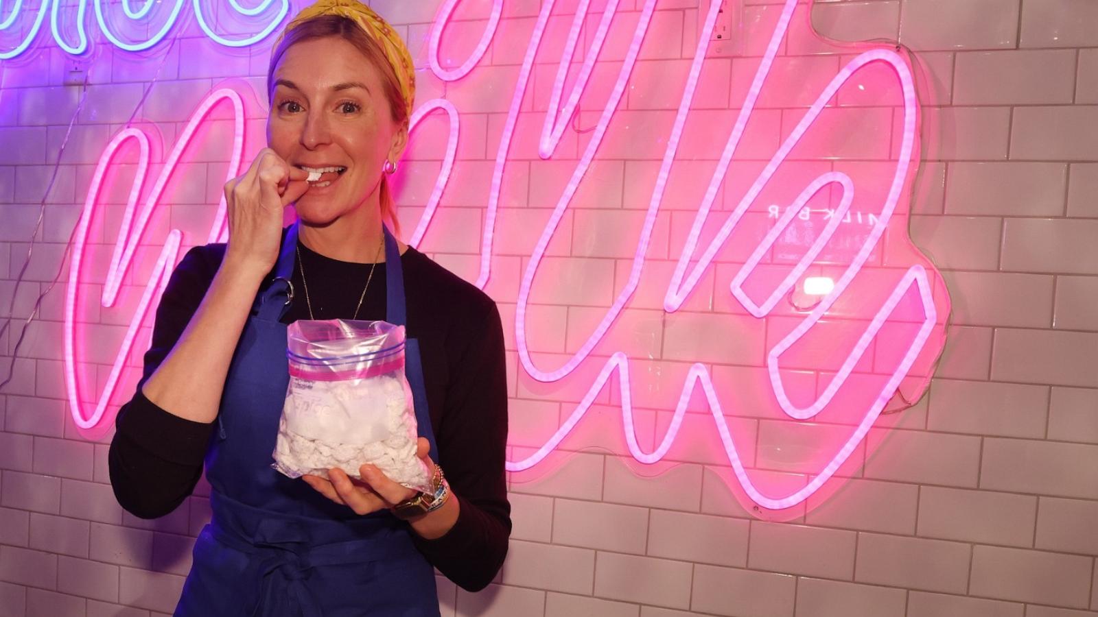 PHOTO: Christina Tosi tastes her new Holiday Mix treat at Milk Bar.