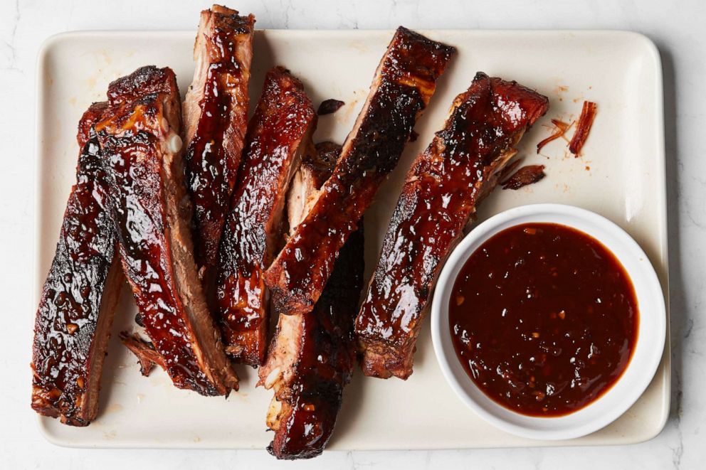 PHOTO: Spicy cola barbecue sauce over grilled ribs. 