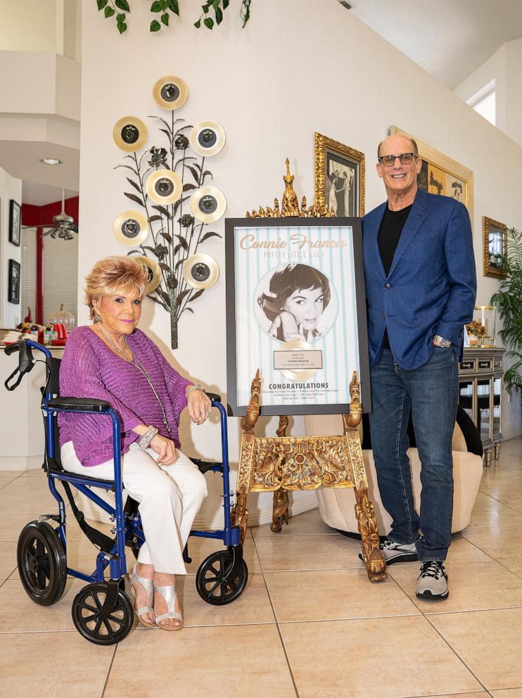 PHOTO: Bruce Resnikkoff, president and CEO of UMe, presents Connie Francis with a plaque at her home in Parkland, Florida.