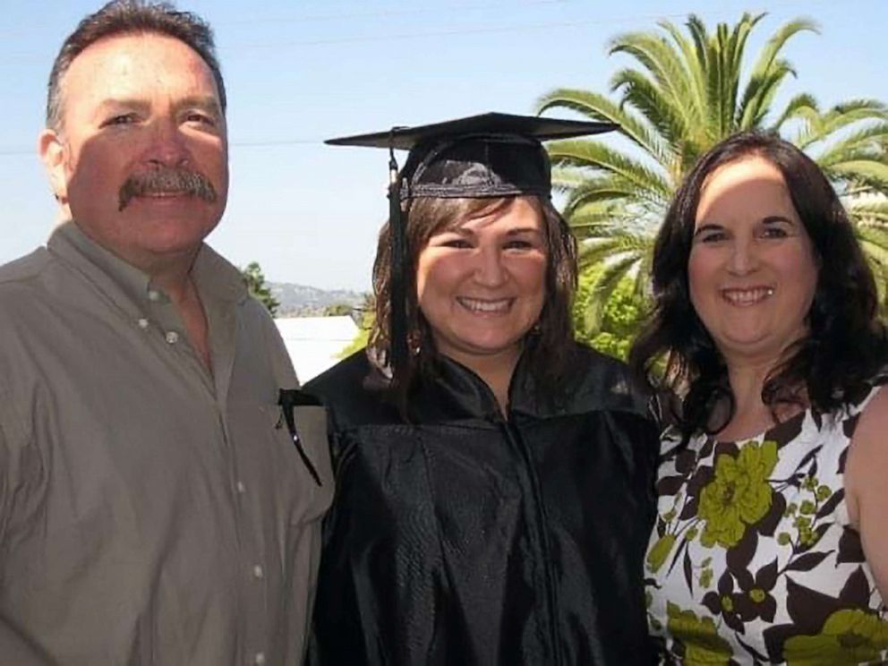 PHOTO: Amanda Courtney, of San Diego, California, poses with her parents at her college graduation.