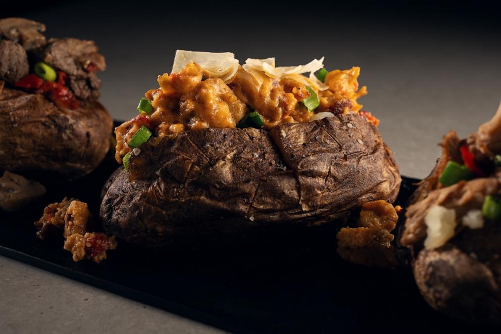 PHOTO: A loaded crawfish baked potato from the Sodexo Live! culinary team being served at Caesars Superdome.