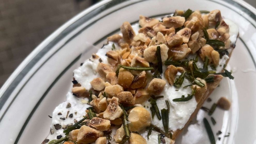 PHOTO: A ricotta crostini with hazelnuts and rosemary.