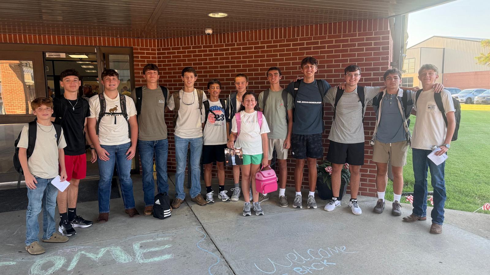 PHOTO: After Brady Curtwright's death, his best friend Gabe Gonzalez and 11 of their friends stepped in to take a back-to-school photo with his younger sister Nora.