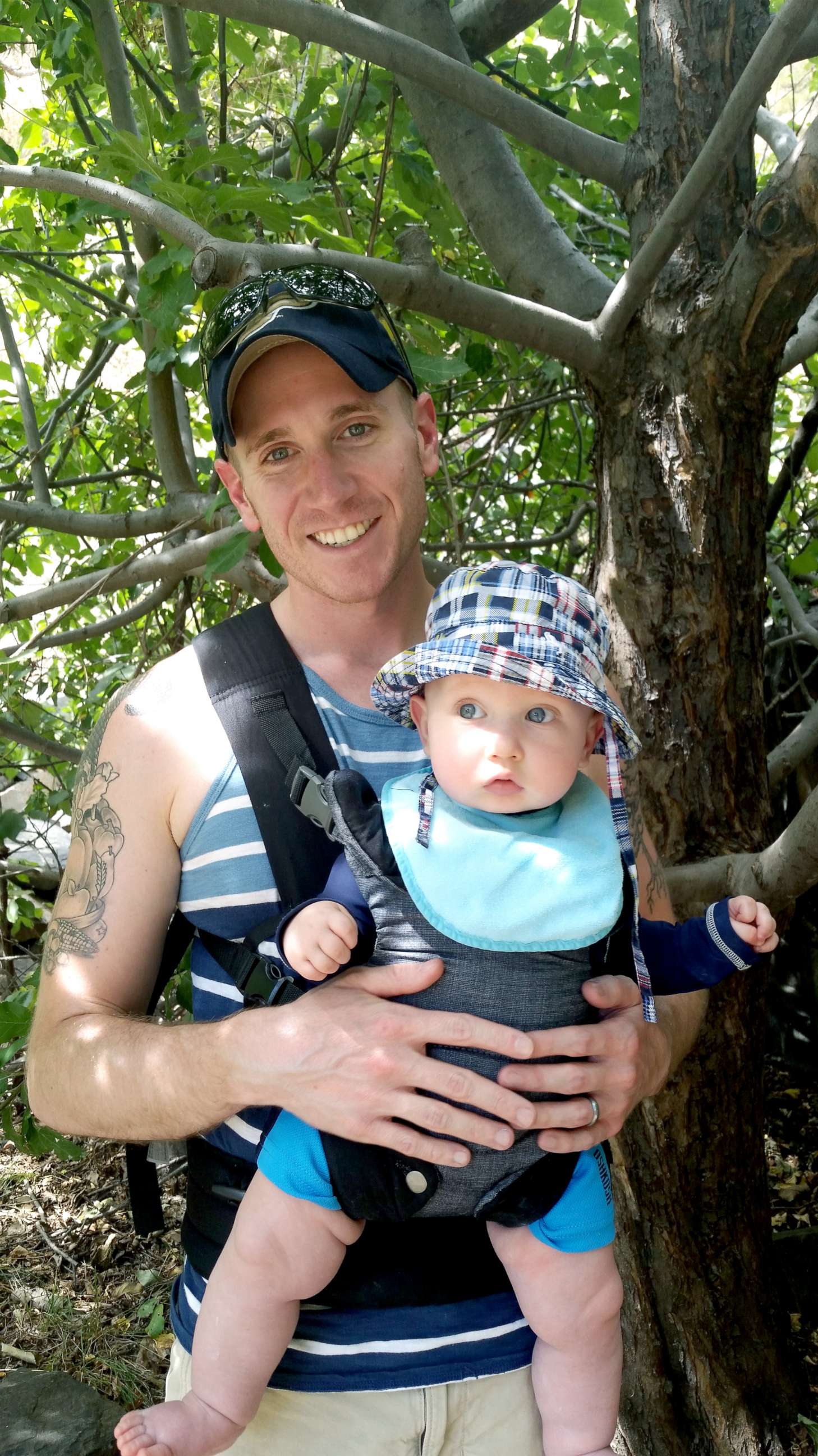 PHOTO: David Milender poses with his son George in this undated family photo.