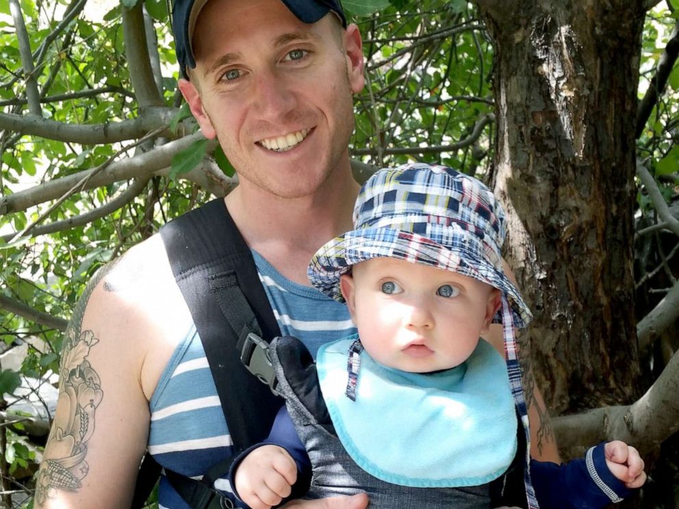 PHOTO: David Milender poses with his son George in this undated family photo.