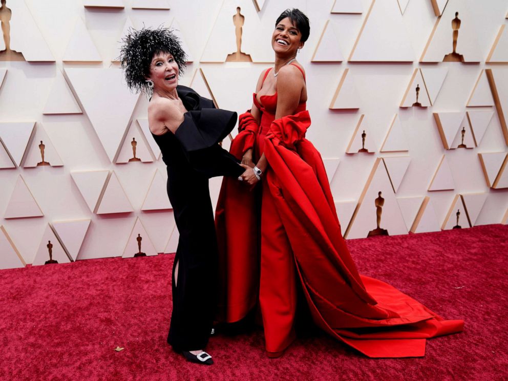 PHOTO: Rita Moreno, left, and Ariana DeBose arrive at the Oscars, March 27, 2022, at the Dolby Theatre in Los Angeles.
