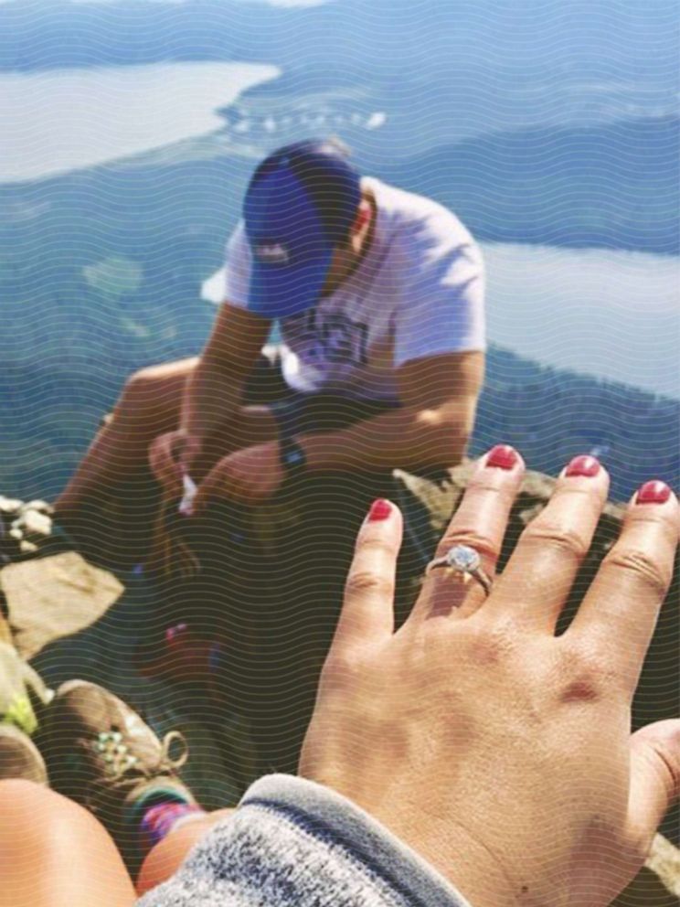 Cari Swanger shows off her engagement ring at Mount Tallac in South Lake Tahoe, California.