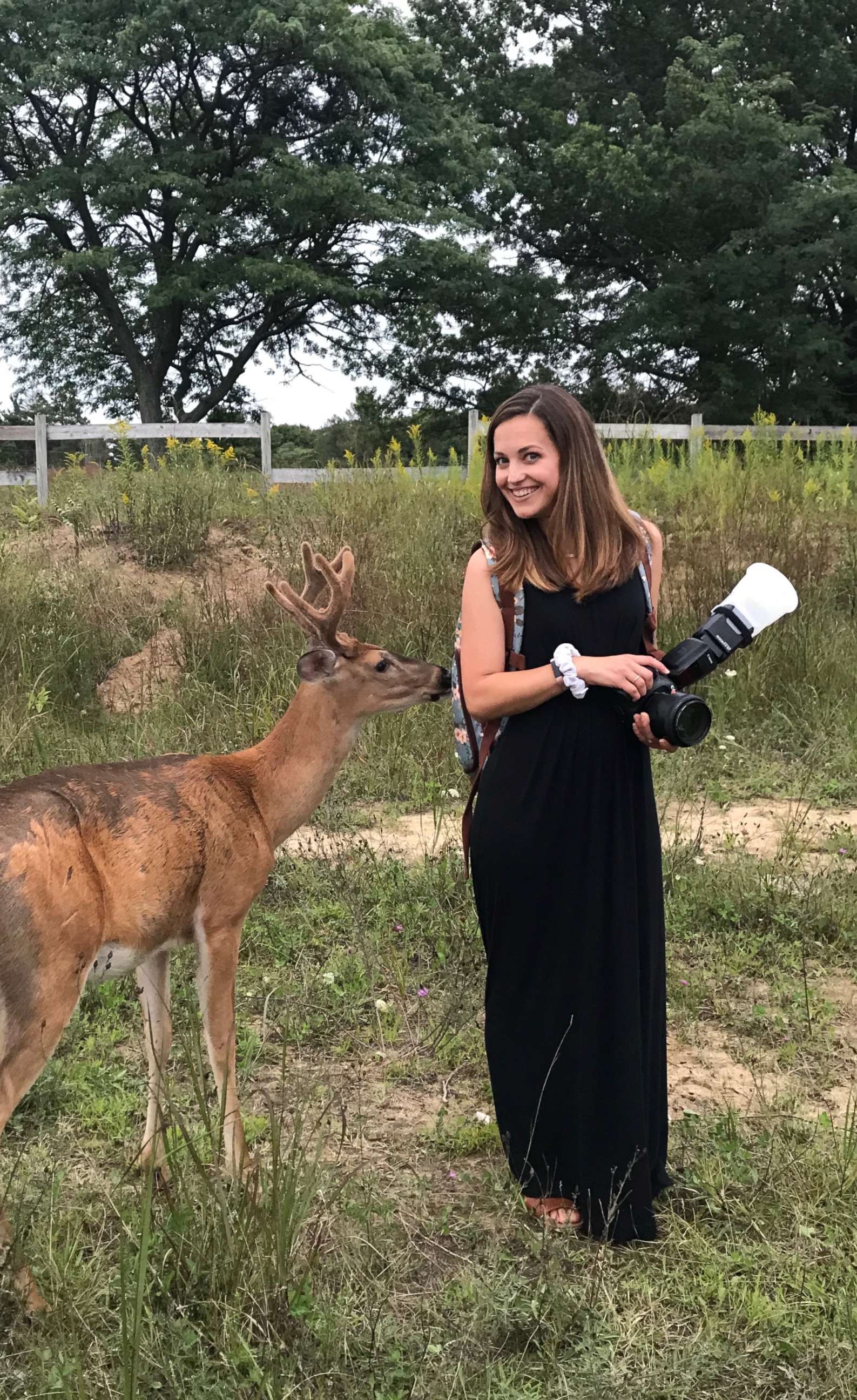 PHOTO: Photographer Laurenda Marie poses next to the deer that surprised her while she was taking wedding photos for the Mackleys.