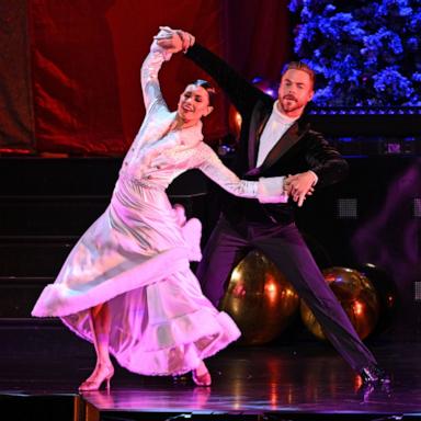 PHOTO: Derek Hough and his wife Hayley Erbert Hough perform during 