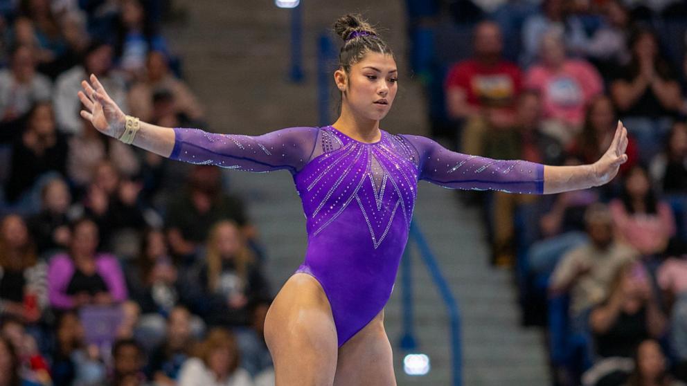 PHOTO: Kayla DiCello performs her balance beam routine during the 2024 Core Hydration Gymnastics Classic at the XL Centre, May 18, 2024, in Hartford, Conn. 