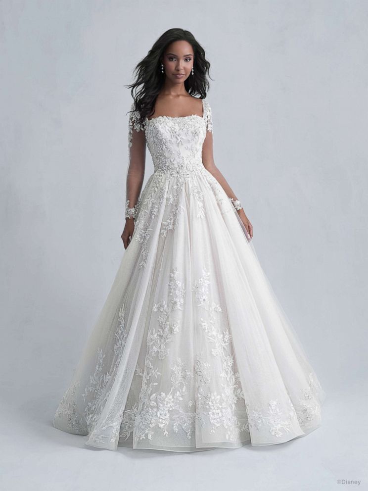 Model is wearing a Disney Fairytale Weddings Platinum Collection by Allure Bridals.