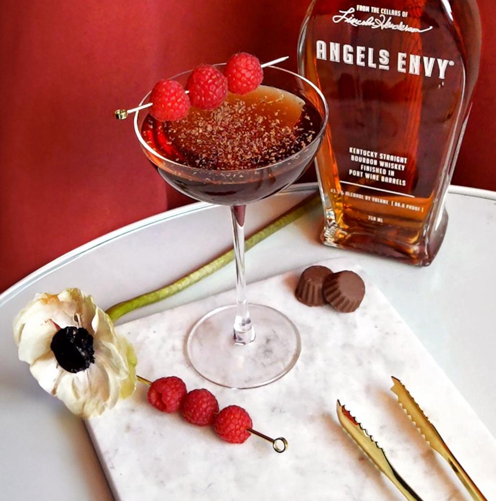 PHOTO: This bourbon cocktail topped with grated dark chocolate and a raspberry.