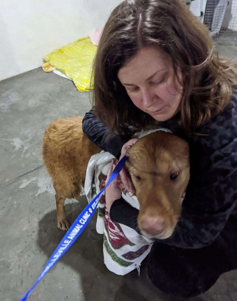 PHOTO: Kate Olson holding Walter after he was rescued. 