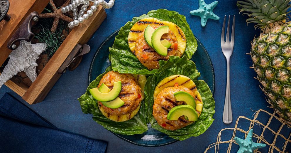 PHOTO: Grilled shrimp and pineapple patties topped with avocado.