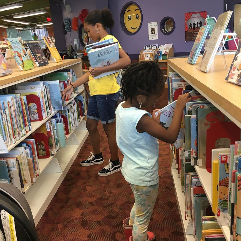 PHOTO: Sisters read bedtime stories to kids live on social media.