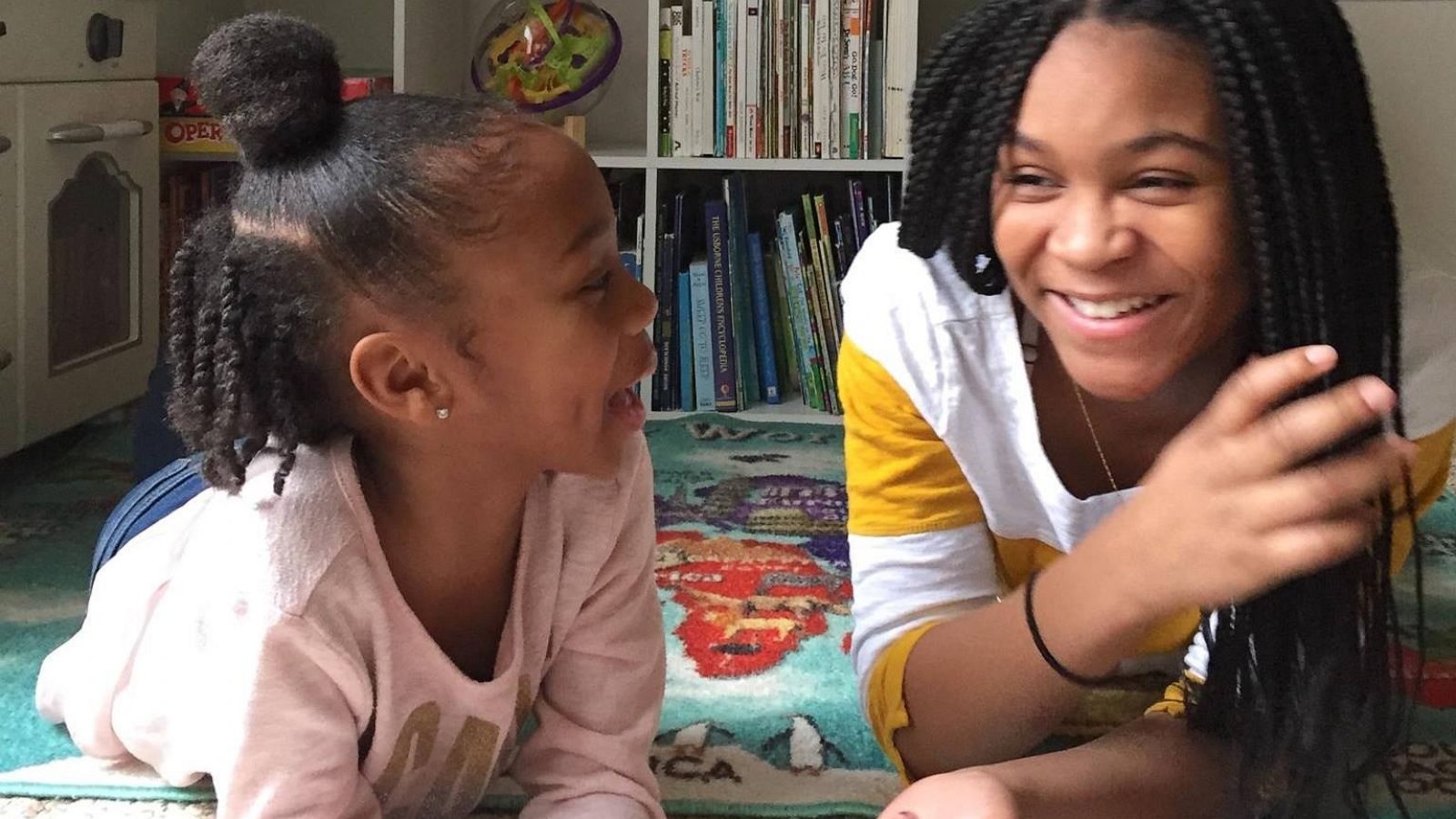 PHOTO: Two sisters share their love of books by reading bedtime stories to kids live on social media.