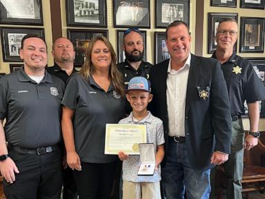 Drake Linn, 11, was honored on July 17 by the Gordon County Sheriff's Office in Georgia, for jumping into action to save his grandfather and himself when his grandfather fell unconscious while driving.
