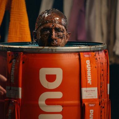 PHOTO: Jeremy Strong emerges from a vat of Dunkin' coffee beans in "The Bean Method."