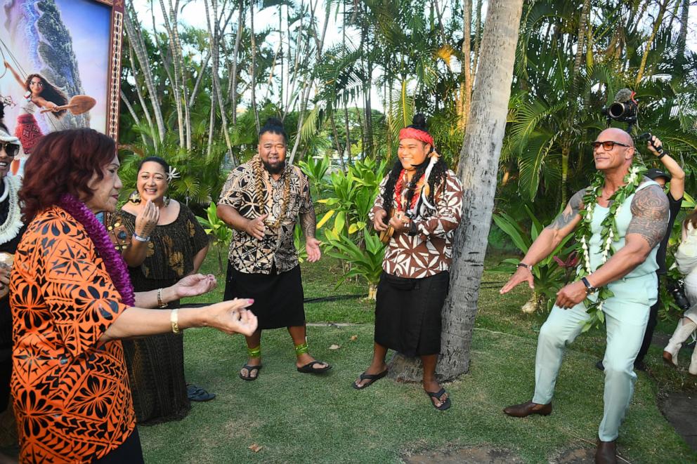 PHOTO: Ata Johnson (far L) and Dwayne Johnson (far R) attend the World Premiere of Walt Disney Animation Studios' "Moana 2" in Kapolei, Hawaii, Nov. 21, 2024. 