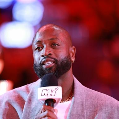 PHOTO: Dwyane Wade is honored following his statue unveiling on October 27th, with a ceremony during a game between the Miami Heat and the Detroit Pistons at Kaseya Center on Oct. 28, 2024 in Miami.