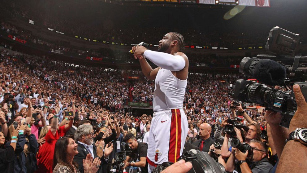 PHOTO:Dwyane Wade of the Miami Heat thanks the crowd after the game against the Philadelphia 76ers on April 9, 2019 at American Airlines Arena in Miami, Fla.