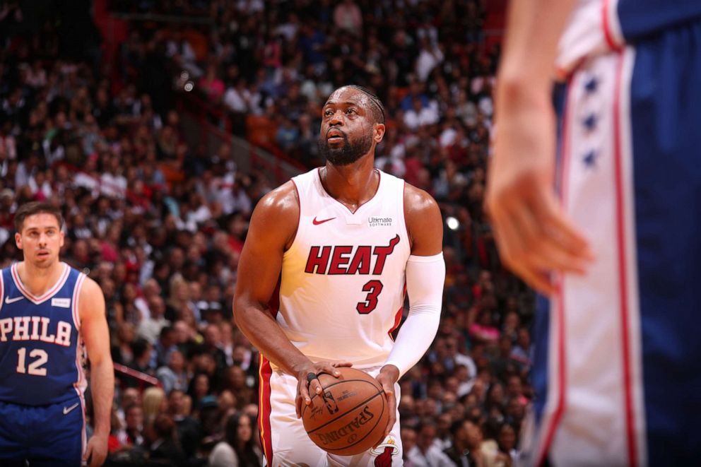 PHOTO: Dwyane Wade of the Miami Heat shoots a free throw during the game against the Philadelphia 76ers on April 9, 2019 at American Airlines Arena in Miami, Fla.