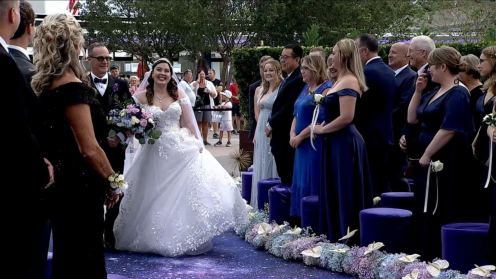 PHOTO: Brooke Weber and Jared Merenuk had an out-of-this-world wedding at Walt Disney World's Spaceship Earth.