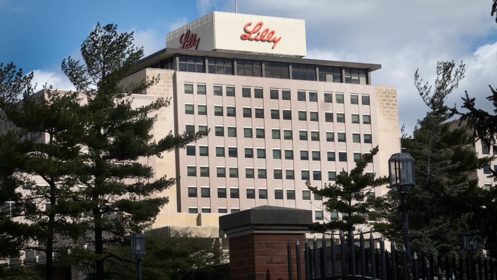 PHOTO: The company logo sits atop a building on the headquarters campus of Eli Lilly and Company, March 17, 2024 in Indianapolis, Indiana.
