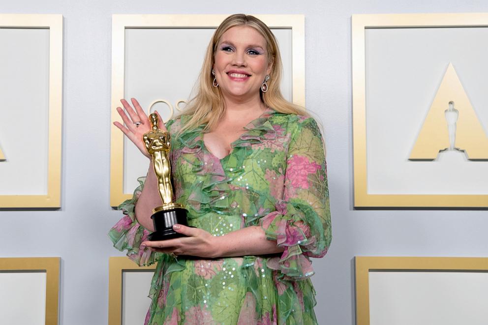 PHOTO: Emerald Fennell, winner of Best Original Screenplay for "Promising Young Woman," poses in the press room during the 93rd Annual Academy Awards at Union Station, April 25, 2021, in Los Angeles.