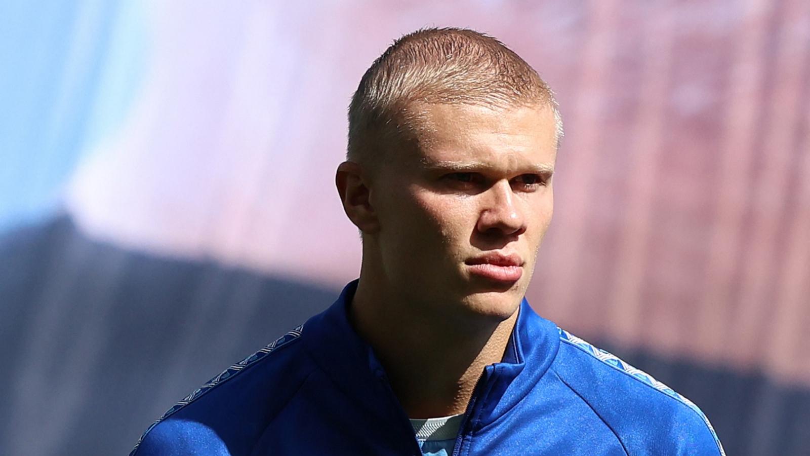 Manchester City's Norwegian striker #09 Erling Haaland, sporting a new hair cut, lines up ahead of the English Premier League football match between Manchester City and AFC Bournemouth on August 23, 2026.