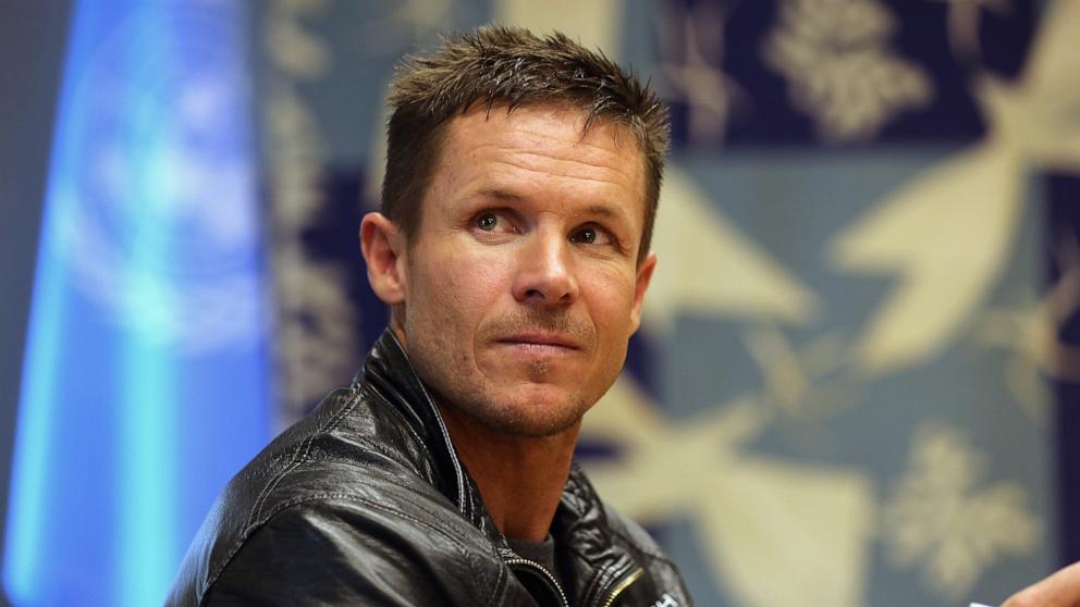PHOTO: Austrian skydiver Felix Baumgartner meets with UN Secretary-General Ban Ki-moon at the United Nations headquarters on October 23, 2012 in New York City. 