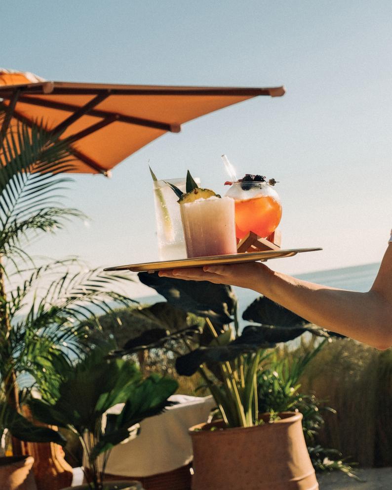 PHOTO: A tray of cocktails from the new poolside escape cabana menu inspired by "The White Lotus."