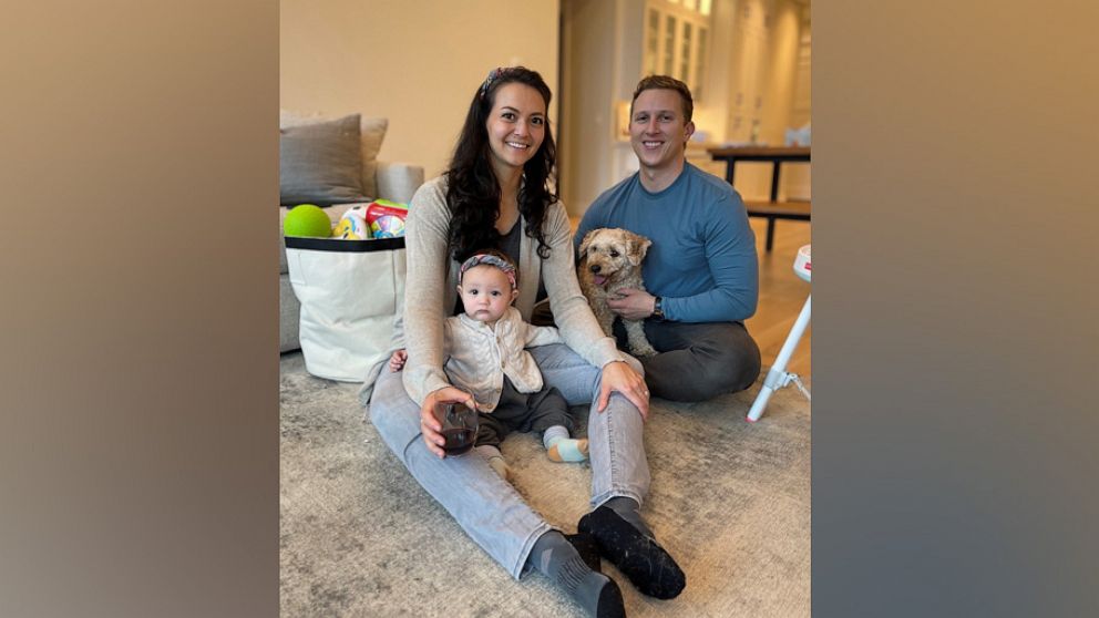 PHOTO: Michael DiBenigno and Kristen Cuneo pose with their daughter, Autumn.