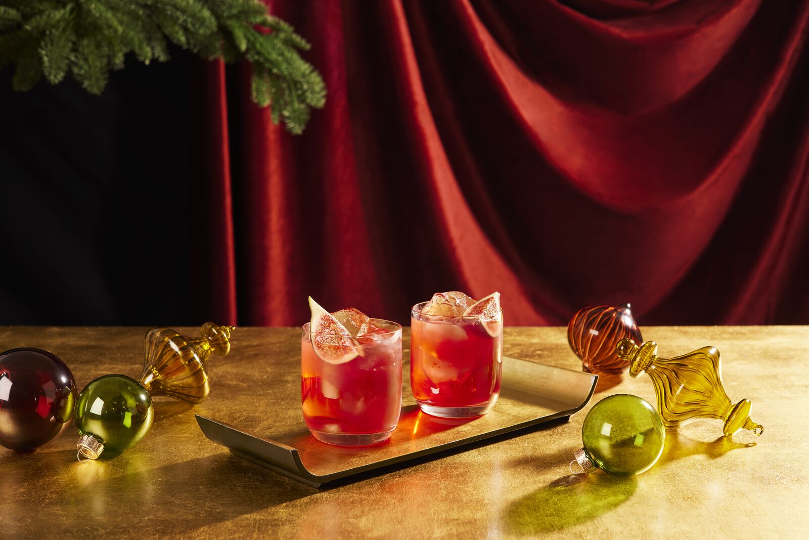 PHOTO: Two festive holiday fig negronis.