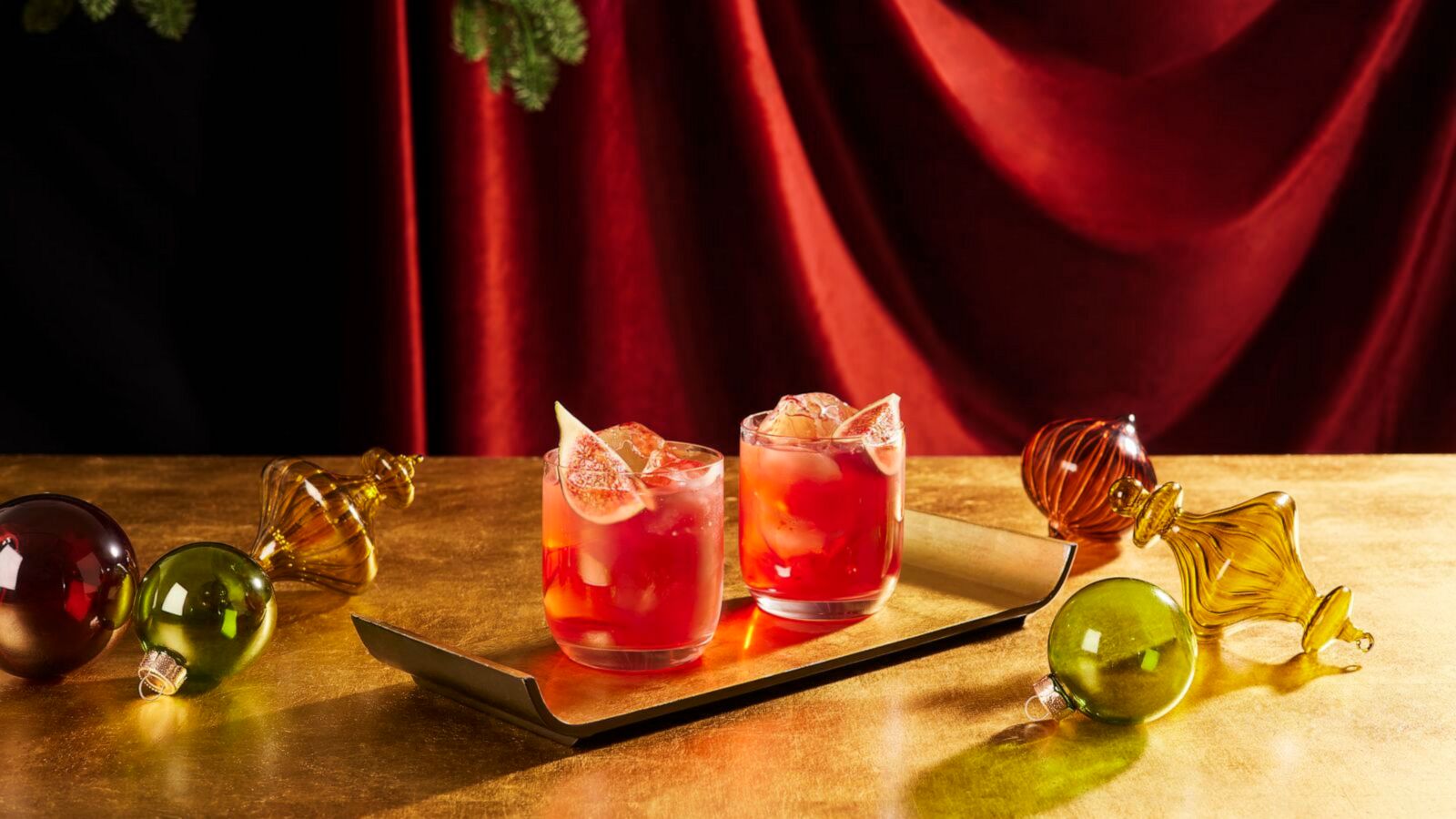 PHOTO: Two festive holiday fig negronis.