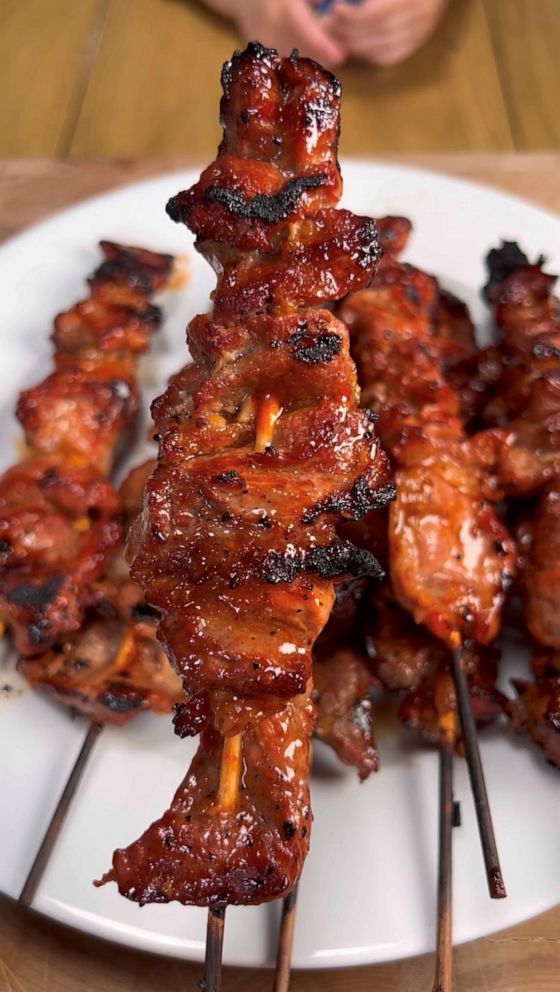 PHOTO: A plate of grilled Filipino marinaded pork skewers.