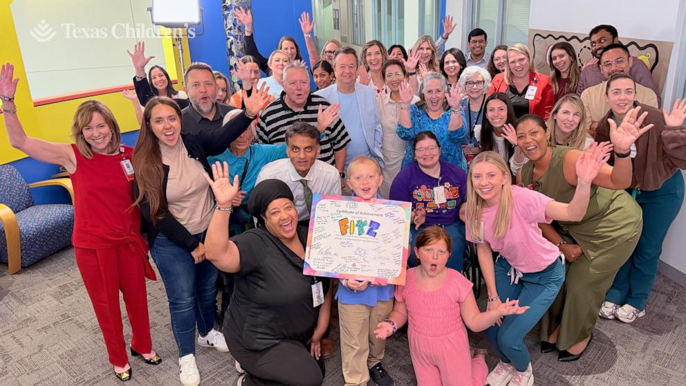 PHOTO: Fitz, 10, rang the bell signifying the end of his treatment on June 24, 2026, after about eight months of chemotherapy, surgery and treatment for a rare liver cancer.
