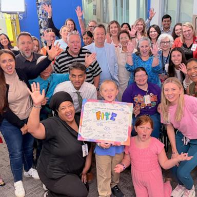 PHOTO: Fitz, 10, rang the bell signifying the end of his treatment on June 24, 2026, after about eight months of chemotherapy, surgery and treatment for a rare liver cancer.