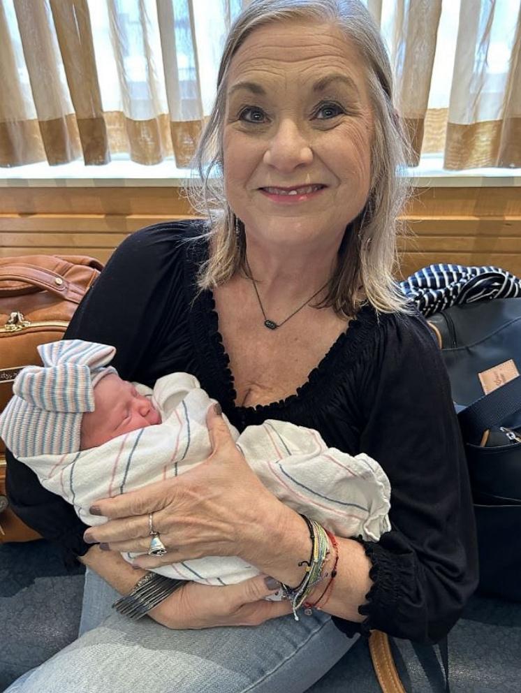 PHOTO: Alicia Fivecoat holds her granddaughter Whitney after her birth on March 27, 2023.