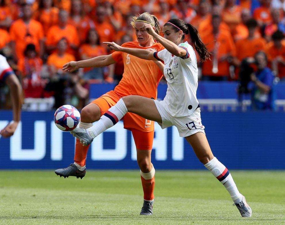 PHOTO: Netherlands' Anouk Dekker, left, fights for the ball with United States' Alex Morgan during the Women's World Cup final soccer match between US and The Netherlands at the Stade de Lyon in Decines, outside Lyon, France, July 7, 2019.