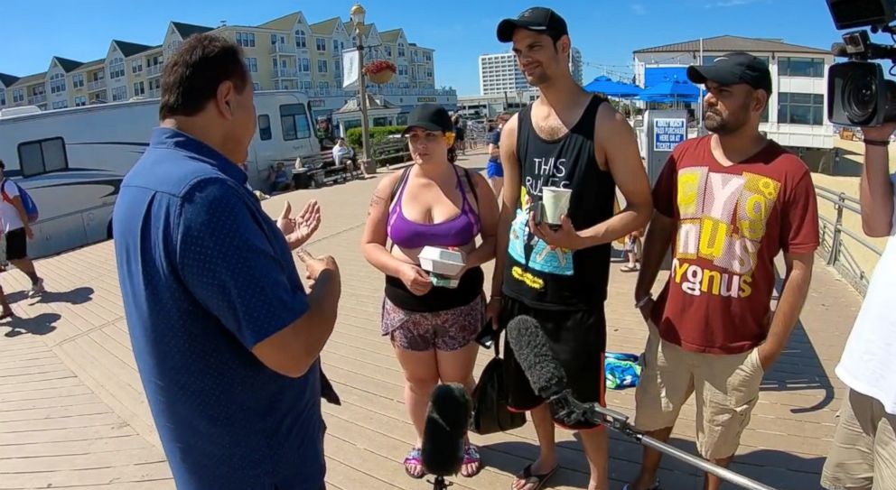 PHOTO: Beach goers being interviewed by host, John Quinones.