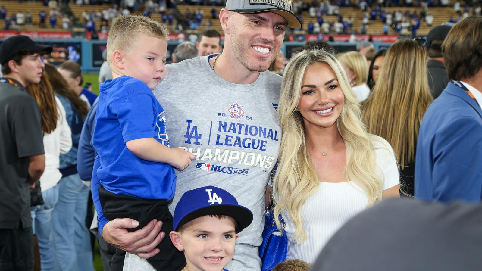 PHOTO: Freddie Freeman of the Los Angeles Dodgers poses for a photo with his family after defeating the New York Mets in Game 6 of the NLCS presented by loanDepot at Dodger Stadium in Los Angeles, Oct. 20, 2024.