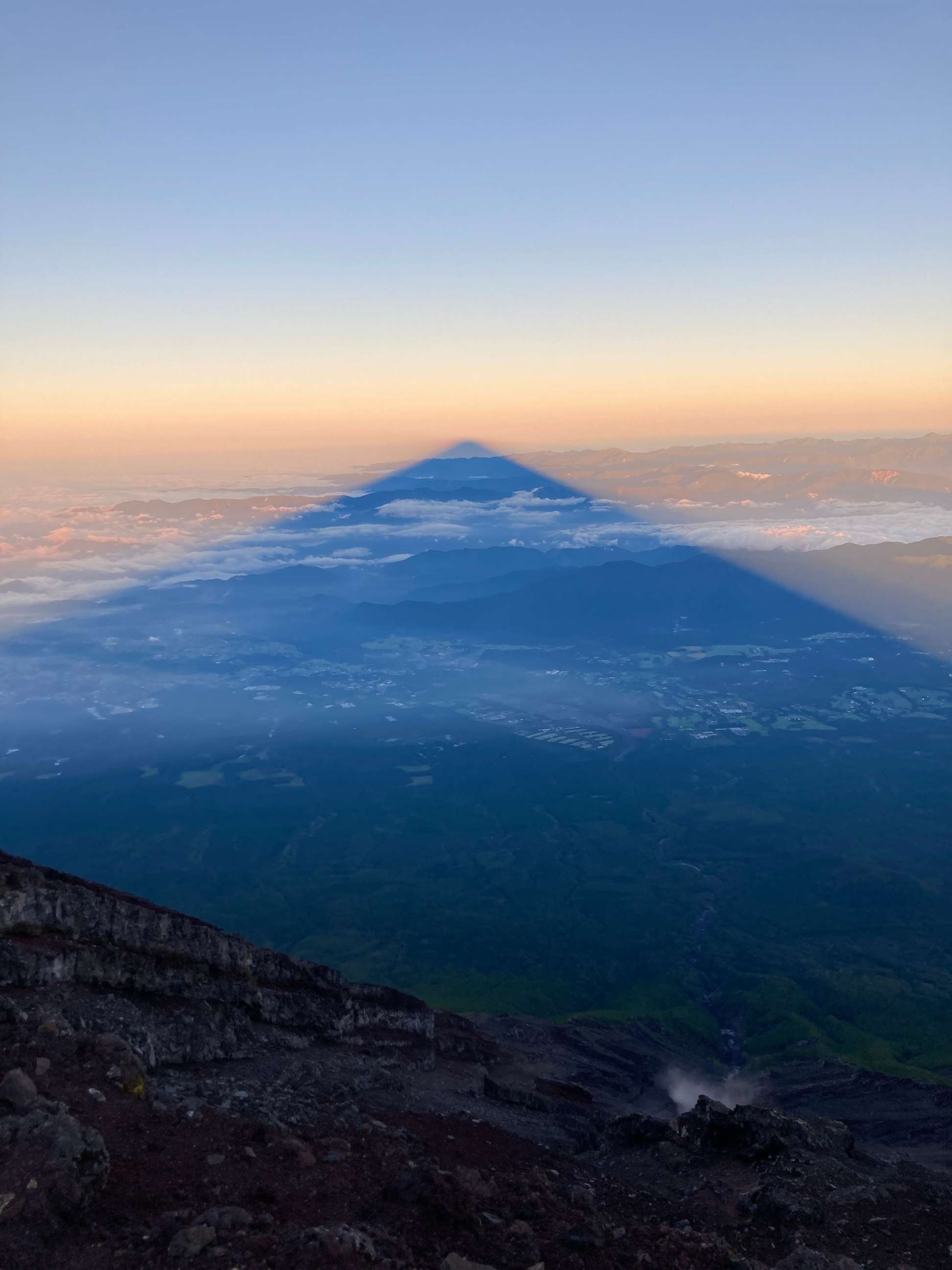 PHOTO: The shadow of Mount Fuji at sunrise. 