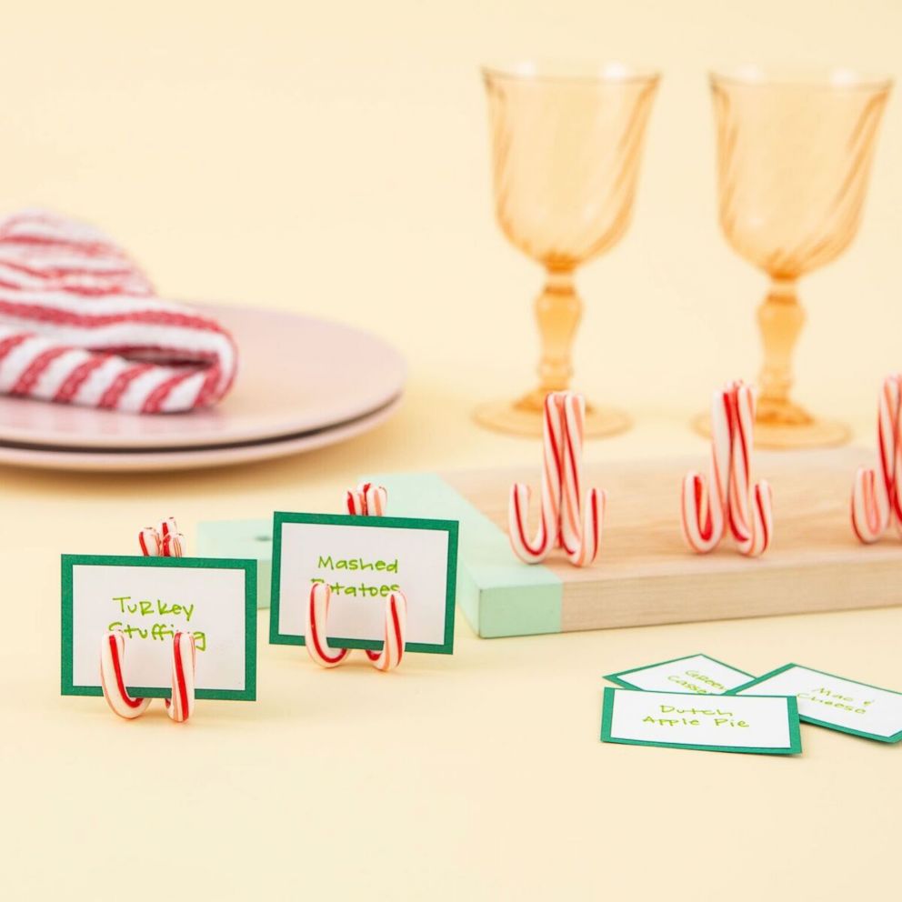 Make candy cane card stands for your next holiday gathering.
