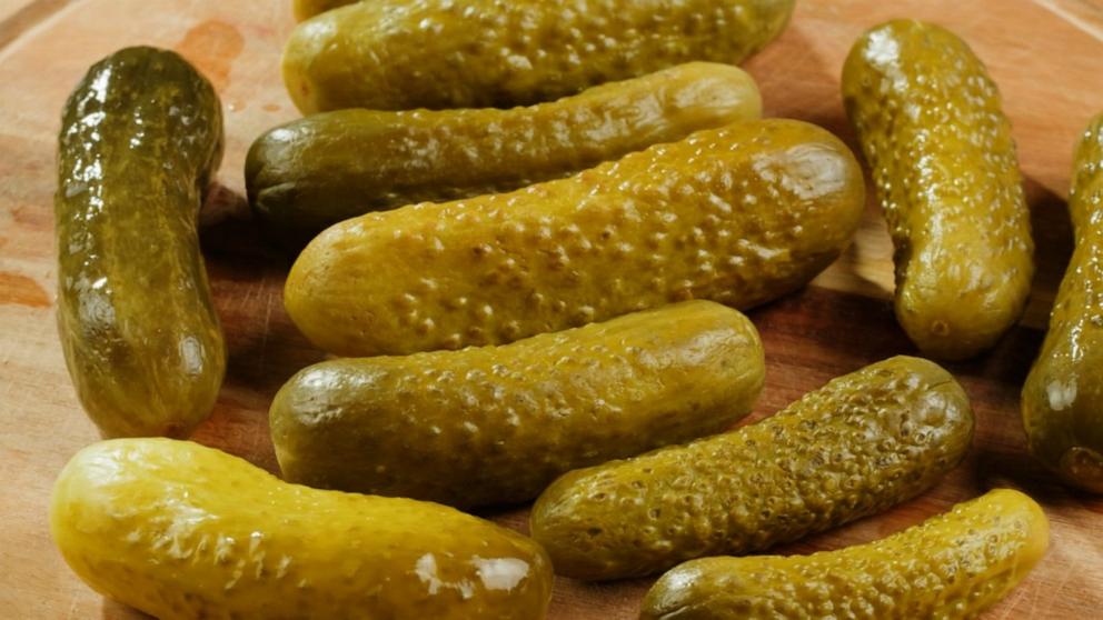 PHOTO: An assortment of pickles on a cutting board.