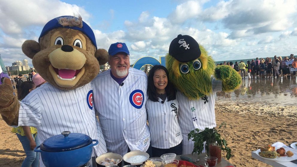 PHOTO: Chef Art Smith and Beverly Kim with the two Chicago MLB mascots.