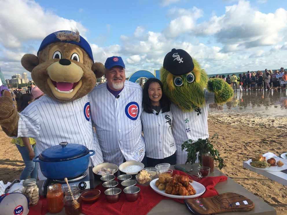 PHOTO: Chef Art Smith and Beverly Kim with the two Chicago MLB mascots.